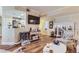 Cozy living room features hardwood floors and natural light; an inviting space for relaxation and entertainment at 2050 W Warm Springs Rd # 3211, Henderson, NV 89014