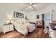 Relaxing main bedroom features hardwood floors and natural light creating an inviting space at 2050 W Warm Springs Rd # 3211, Henderson, NV 89014