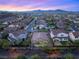 Picturesque aerial view of a tranquil suburban community with meticulously landscaped yards at 2116 Canvas Edge Dr, Henderson, NV 89044