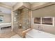 Spa-like bathroom boasting a soaking tub and separate glass-enclosed shower at 2116 Canvas Edge Dr, Henderson, NV 89044