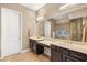 Elegant bathroom featuring double sinks and vanity, with stylish fixtures and finishes at 2116 Canvas Edge Dr, Henderson, NV 89044