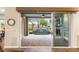 View from inside of the home looking out to a beautiful patio with a fountain feature at 2116 Canvas Edge Dr, Henderson, NV 89044