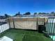 Outdoor patio area with faux grass at 225 Greenbriar Townhouse Way, Las Vegas, NV 89121