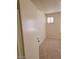 Bedroom with carpet and a window covered with white blinds at 2417 St George St, North Las Vegas, NV 89030