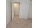 Bedroom with carpet and a doorway at 2417 St George St, North Las Vegas, NV 89030
