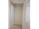 Shows simple hallway design, connecting carpeted floors to other rooms at 2417 St George St, North Las Vegas, NV 89030