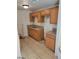 Functional kitchen showing cabinets, countertops, tile flooring, and fixtures, designed for practical use at 2417 St George St, North Las Vegas, NV 89030