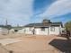 Expansive backyard with gravel, bordered by chain-link fencing, ready for your personal touch at 26 E Atlantic Ave, Henderson, NV 89015