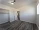 Bedroom with new floors, a window, and a closet with shelving at 26 E Atlantic Ave, Henderson, NV 89015