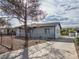 Single-story home featuring a fenced yard and private driveway at 26 E Atlantic Ave, Henderson, NV 89015