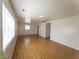 Spacious living room featuring hardwood floors, neutral walls, and bright, natural light at 26 E Atlantic Ave, Henderson, NV 89015