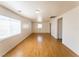 Large living room featuring hardwood floors, neutral walls, and bright, natural light at 26 E Atlantic Ave, Henderson, NV 89015