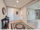 Welcoming entryway with neutral tones, a decorative rug, and views into the adjacent living space at 262 Inflection St, Henderson, NV 89011
