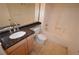Bright bathroom featuring a granite countertop, vanity, and a shower-tub combo at 270 E Flamingo Rd # 136, Las Vegas, NV 89169