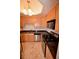 Kitchen showcasing stainless steel appliances, granite countertops, and tile flooring at 270 E Flamingo Rd # 136, Las Vegas, NV 89169