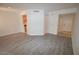 View of the open-concept living room showcasing modern floors at 270 E Flamingo Rd # 136, Las Vegas, NV 89169
