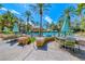 Resort-style pool with tables, seating, and shade umbrellas at 270 E Flamingo Rd # 136, Las Vegas, NV 89169