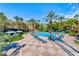 Stunning pool area with palm trees, lounge chairs, and ample space for relaxation at 270 E Flamingo Rd # 136, Las Vegas, NV 89169