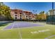Exterior view of community tennis court with lush landscaping at 270 E Flamingo Rd # 136, Las Vegas, NV 89169