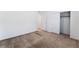 This well-lit bedroom is carpeted and has a large double door closet at 2767 Lindsey Springs St, Las Vegas, NV 89142