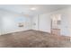 This bedroom has two windows, neutral walls and carpet, and an ensuite bathroom with double sinks at 2767 Lindsey Springs St, Las Vegas, NV 89142