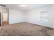 This bedroom is spacious and bright, with plush carpet and a large window that lets in plenty of natural light at 2767 Lindsey Springs St, Las Vegas, NV 89142