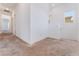 Second floor hallway showcasing a neutral color palette, carpet, and natural light at 2767 Lindsey Springs St, Las Vegas, NV 89142
