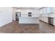 Spacious kitchen with stainless steel appliances, white cabinets, and a large island at 2767 Lindsey Springs St, Las Vegas, NV 89142