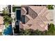 Overhead view of house showing tile roof, pool, patio and landscaping at 2826 Barrow Downs St, Las Vegas, NV 89135