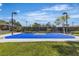 Community basketball court with lighting, providing a space for athletic activities and recreation at 2826 Barrow Downs St, Las Vegas, NV 89135