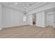Spacious bedroom with recessed lighting, light wood floors, and natural light at 2826 Barrow Downs St, Las Vegas, NV 89135
