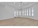 Bright bedroom with large windows, natural light, and recessed lighting at 2826 Barrow Downs St, Las Vegas, NV 89135