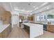 Modern kitchen featuring a large center island, stainless steel appliances, and stylish cabinetry at 2826 Barrow Downs St, Las Vegas, NV 89135
