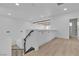 View of a loft area featuring built-in storage cabinets and staircase with ornate railings at 2826 Barrow Downs St, Las Vegas, NV 89135