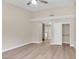 Bright bedroom with a ceiling fan, light wood floors and closet at 2851 S Valley View Blvd # 1195, Las Vegas, NV 89102