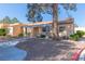 Inviting single-story home with a charming pergola-covered entrance and well-maintained landscaping at 2851 S Valley View Blvd # 1195, Las Vegas, NV 89102