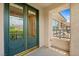 Balcony entrance through double glass doors with gold trim offers exterior views at 3010 Hammerwood Dr, Las Vegas, NV 89135