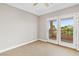 Bedroom featuring large glass doors leading to an outside balcony at 3010 Hammerwood Dr, Las Vegas, NV 89135