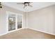 Bedroom featuring large glass doors and an outside balcony at 3010 Hammerwood Dr, Las Vegas, NV 89135