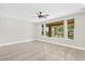 Open bonus room with large windows provides pool views and ample natural light and travertine flooring at 3010 Hammerwood Dr, Las Vegas, NV 89135