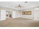 Spacious bonus room with neutral carpet and a view of another room through the doorway at 3010 Hammerwood Dr, Las Vegas, NV 89135