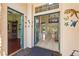 Inviting home entryway with decorative lizards, high ceilings, and views of the living spaces at 3010 Hammerwood Dr, Las Vegas, NV 89135
