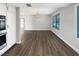 Dining room featuring hardwood floors and natural light with direct access to the kitchen at 3142 Espanol Dr, Las Vegas, NV 89121