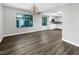 Dining room featuring hardwood floors and natural light with direct access to the kitchen at 3142 Espanol Dr, Las Vegas, NV 89121