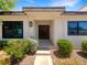 Inviting home entrance with a double door, manicured landscaping, and charming curb appeal at 3142 Espanol Dr, Las Vegas, NV 89121