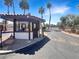 Community guard house with palm trees, offering security and controlled access at 3142 Espanol Dr, Las Vegas, NV 89121