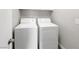 Laundry room featuring a white washer and dryer set against a neutral wall at 3142 Espanol Dr, Las Vegas, NV 89121