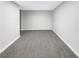 Spacious living room with neutral paint and carpeted floors, offering a blank canvas for customization at 3142 Espanol Dr, Las Vegas, NV 89121