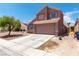 Charming two-story home with attached garage and low-maintenance desert landscaping at 3547 Empress Diamond Dr, North Las Vegas, NV 89032