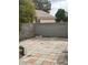 Backyard features concrete block wall, some paving stones, and is ready to be customized at 3729 Bronco Billy Ct, Las Vegas, NV 89129
